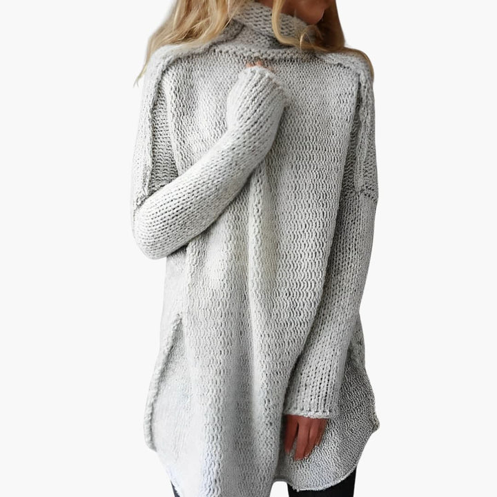 Damen pullover mit hohem Kragen und langem Saum