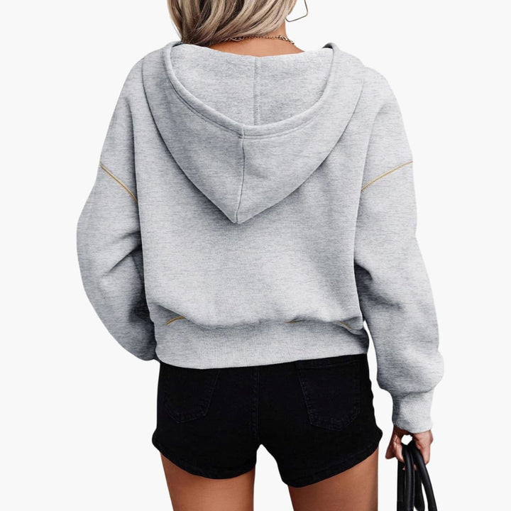 Damen Hoodie mit halbem Reißverschluss und geripptem Saum