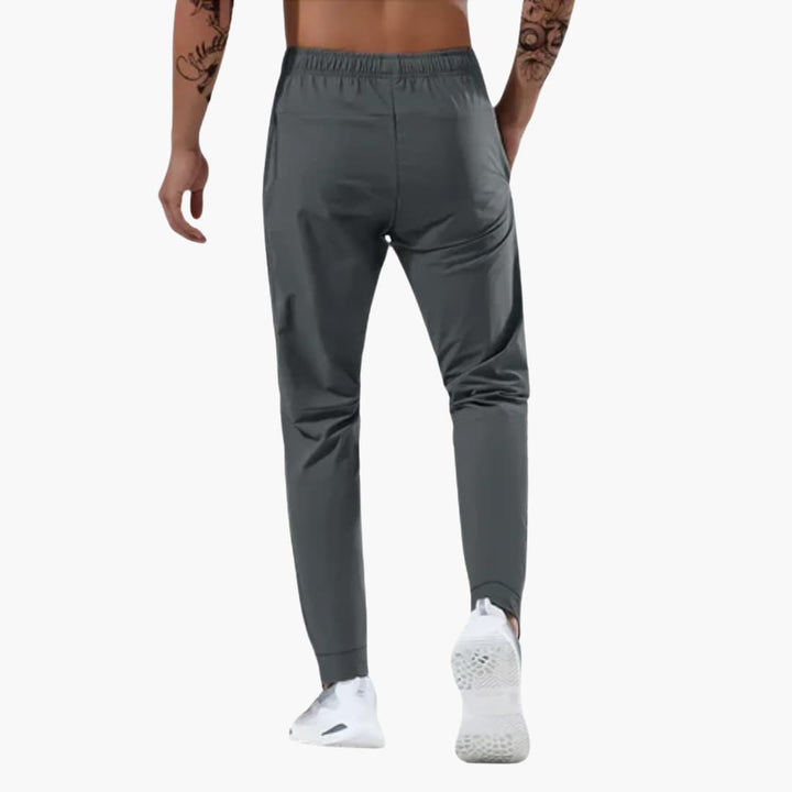Herren Trainingshose mit elastischem Bund und Reißverschlusstaschen
