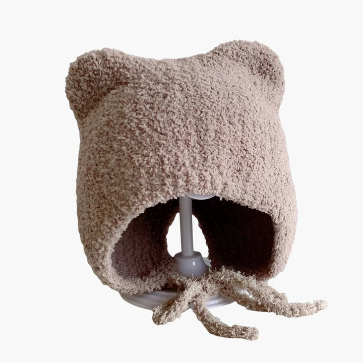 Baby Wintermütze mit Ohrenklappen und runder Form