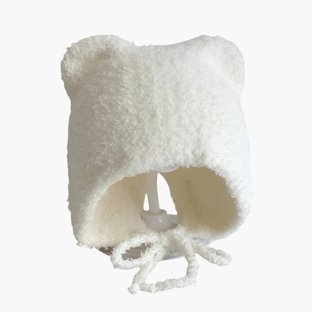 Baby Wintermütze mit Ohrenklappen und runder Form