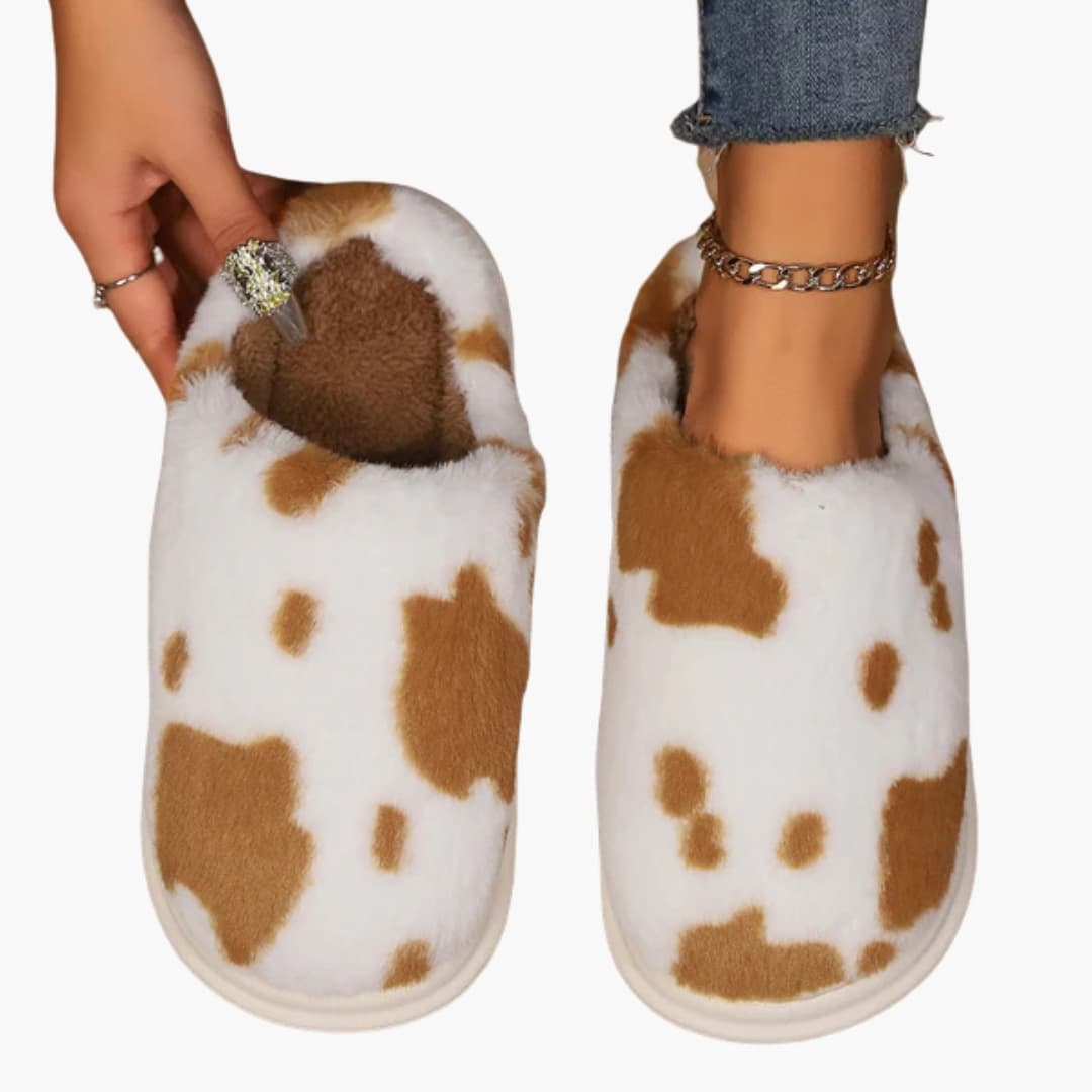 Damen Hausschuhe mit Kuhmuster und Plüschfutter