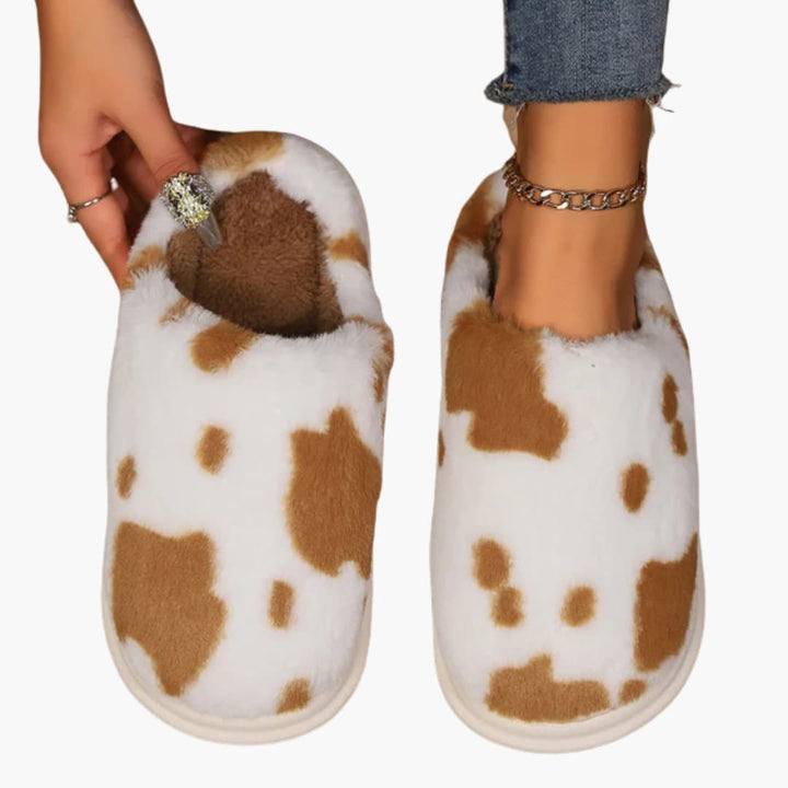 Damen Hausschuhe mit Kuhmuster und Plüschfutter