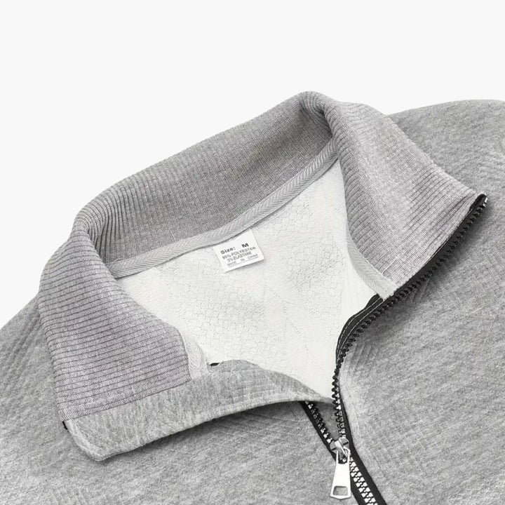 Herren pullover mit Reißverschluss-Ausschnitt und Zopfmuster Oberfläche