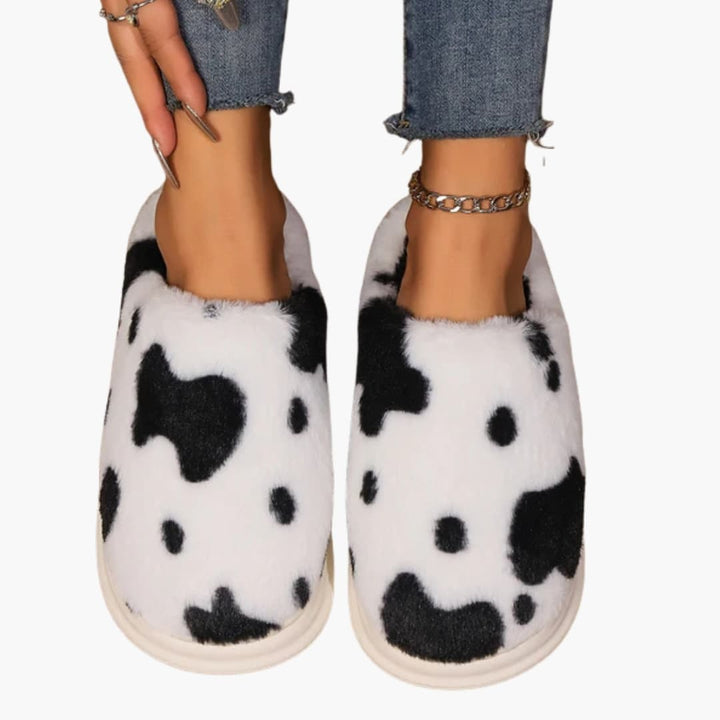 Damen Hausschuhe mit Kuhmuster und Plüschfutter