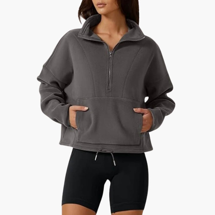 Damenpullover mit Halbreißverschluss und Fronttasche