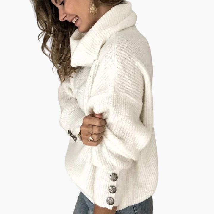 Damenpullover mit Rollkragen und Ärmelknöpfen